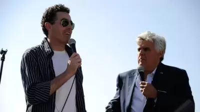 Jay Leno and Adam Carolla attend the Shakespeare Festival. (Photo Harrison/Getty Images)by Frazer Harrison/Getty Images) Jay Leno and Adam Carolla attend the Shakespeare Festival. (Photo Harrison/Getty Images)by Frazer Harrison/Getty Images)