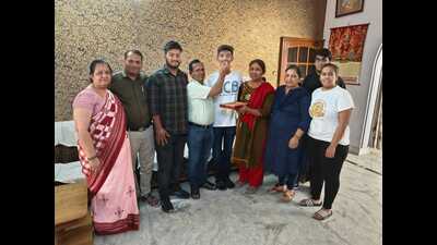 Lakshay Garg of Kaithal with his family members. Lakshay Garg of Kaithal with his family members.