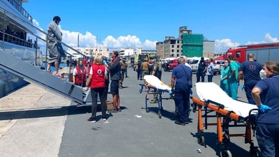 Survivors arrive by yacht after a rescue operation at the port in Kalamata town, about 240 kilometers (150miles) southwest of Athens on Wednesday. (AP) Survivors arrive by yacht after a rescue operation at the port in Kalamata town, about 240 kilometers (150miles) southwest of Athens on Wednesday. (AP)