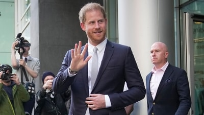 Prince Harry leaves the High Court after giving evidence in London. (AP) Prince Harry leaves the High Court after giving evidence in London. (AP)