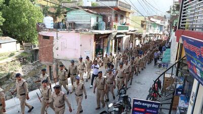 Police carry out flag march in Purola town on Wednesday. (HT Photo) Police carry out flag march in Purola town on Wednesday. (HT Photo)