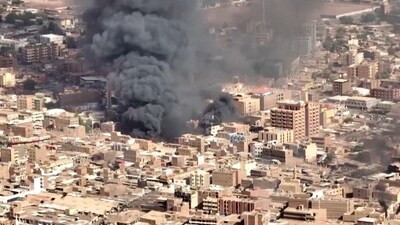 An aerial view of the black smoke and flames at a market in Omdurman, Khartoum North, Sudan. (via REUTERS)
