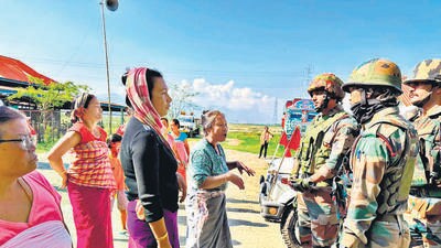 Villagers stop army officials at Chanung in Taretkhel area of Imphal. Villagers stop army officials at Chanung in Taretkhel area of Imphal.