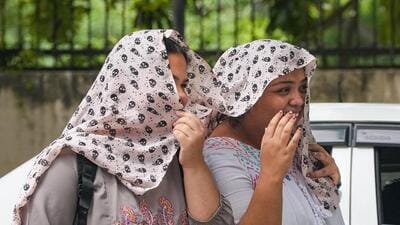 Women cover themselves on a hot Wednesday in Delhi. (PTI) Women cover themselves on a hot Wednesday in Delhi. (PTI)