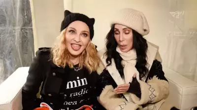 Madonna (left) and Cher. Madonna (left) and Cher.
