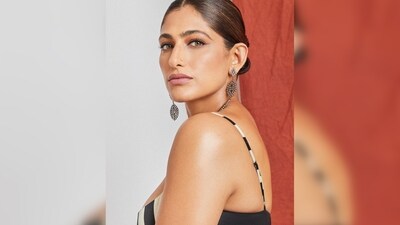 Kubra Sait's set comes with a black and white striped print on a crepe bustier and a satin circular gather skirt. (Instagram/@kubbrasait) Kubra Sait's set comes with a black and white striped print on a crepe bustier and a satin circular gather skirt. (Instagram/@kubbrasait)