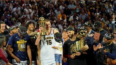 Nikola Jokic (in middle) with Denver Nuggets after the side's NBA title triumph (REUTERS) Nikola Jokic (in middle) with Denver Nuggets after the side's NBA title triumph (REUTERS)