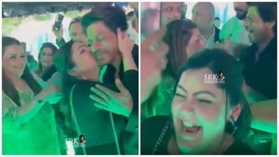 Shah Rukh Khan's fan kissed him on the cheek and later laughed with joy at having done it. Shah Rukh Khan's fan kissed him on the cheek and later laughed with joy at having done it.