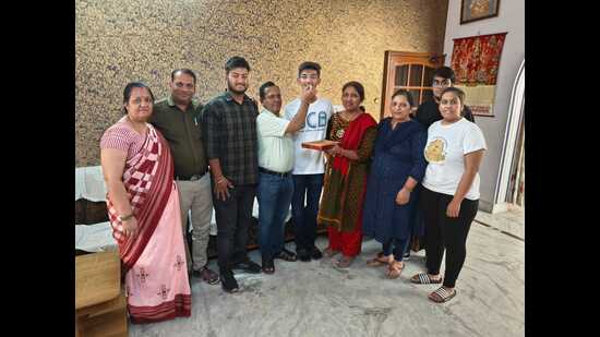Lakshay Garg of Kaithal with his family members.