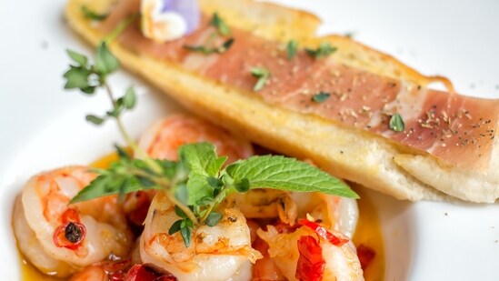 Seafood: During the monsoon, the breeding season for fish and other seafood, their availability decreases, and the chances of contamination increase. It's better to avoid seafood or ensure it is sourced from reliable and hygienic sources.&nbsp;(Unsplash)