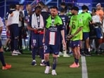 Paris Saint-Germain's Argentine forward Lionel Messi walks off the winners stand during the 2022-2023 Ligue 1 championship trophy ceremony Paris Saint-Germain's Argentine forward Lionel Messi walks off the winners stand during the 2022-2023 Ligue 1 championship trophy ceremony