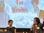 Hindu American Foundation’s Associate Policy Director Anita Joshi and Board Member Rajiv Pandit displaying types of resources HAF used to educate lawmakers and Hindu American communities.