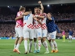Soccer Football - UEFA Nations League - Semi Final - Netherlands v Croatia - Feyenoord Stadium, Rotterdam, Netherlands - June 14, 2023 Croatia's Luka Modric celebrates scoring their fourth goal with teammates REUTERS/Wolfgang Rattay
