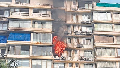 “We heard loud fire alarms and came out. There was a strong burning smell. We saw a small fire in the high rise, then the glass broke, and huge flames came out,” an onlooker said on the condition of anonymity. (HT PHOTO) “We heard loud fire alarms and came out. There was a strong burning smell. We saw a small fire in the high rise, then the glass broke, and huge flames came out,” an onlooker said on the condition of anonymity. (HT PHOTO)