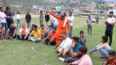 A few right wing activists staging a symbolic protest at Purola stadium after failing to hold mahapanchayat. (HT Photo | Rajeev Kala)