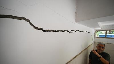 A massive crack developed in the stilt parking at the Signature View Apartment at Mukherjee Nagar. The building has been declared dangerous. (Sanchit Khanna/HT Photo) A massive crack developed in the stilt parking at the Signature View Apartment at Mukherjee Nagar. The building has been declared dangerous. (Sanchit Khanna/HT Photo)