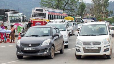 Amidst intermittent shooting stones on the Jammu-Srinagar national highway in Ramban district, the stranded vehicles were being cleared by the traffic police authorities on Thursday, said officials. (ANI File Photo)