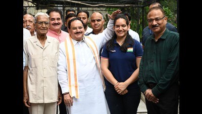 BJP national president JP Nadda with Olympian and Arjuna Awardee, shooter Anjum Moudgil at her residence in Sector 37, Chandigarh, on Thursday. (Ravi Kumar/HT) BJP national president JP Nadda with Olympian and Arjuna Awardee, shooter Anjum Moudgil at her residence in Sector 37, Chandigarh, on Thursday. (Ravi Kumar/HT)