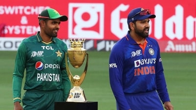 India's Rohit Sharma and Pakistan's Babar Azam pose with the Asia Cup trophy after the toss (REUTERS)