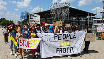 Climate crisis activists protest in Bonn on Monday. (Reuters) Climate crisis activists protest in Bonn on Monday. (Reuters)