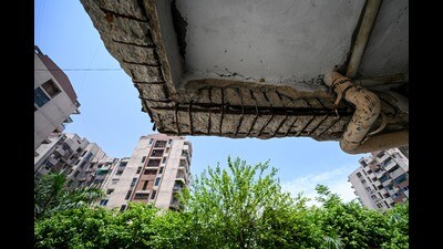 Damaged ceiling of the stilt parking at a tower in the Signature view Apartments at Mukherjee Nagar. (Sanchit Khanna/HT) Damaged ceiling of the stilt parking at a tower in the Signature view Apartments at Mukherjee Nagar. (Sanchit Khanna/HT)