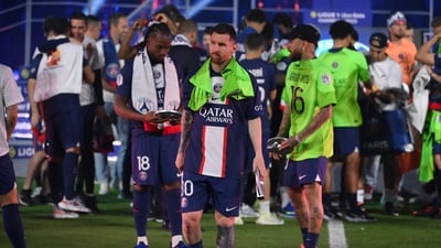 Paris Saint-Germain's Argentine forward Lionel Messi walks off the winners stand during the 2022-2023 Ligue 1 championship trophy ceremony (AFP) Paris Saint-Germain's Argentine forward Lionel Messi walks off the winners stand during the 2022-2023 Ligue 1 championship trophy ceremony (AFP)