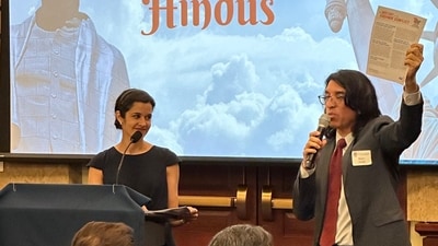 Hindu American Foundation’s Associate Policy Director Anita Joshi and Board Member Rajiv Pandit displaying types of resources HAF used to educate lawmakers and Hindu American communities. (@HinduAmerican) Hindu American Foundation’s Associate Policy Director Anita Joshi and Board Member Rajiv Pandit displaying types of resources HAF used to educate lawmakers and Hindu American communities. (@HinduAmerican)