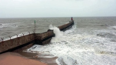Strong winds and high tides triggered by Cyclone Biparjoy at Mandvi beach in Kachchh district of Gujarat on Wednesday. (ANI Photo) Strong winds and high tides triggered by Cyclone Biparjoy at Mandvi beach in Kachchh district of Gujarat on Wednesday. (ANI Photo)