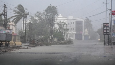A view of heavy rainfall with strong winds as cyclone Biparjoy starts making landfall at Mandvi, in Kutch, Thursday. (PTI)