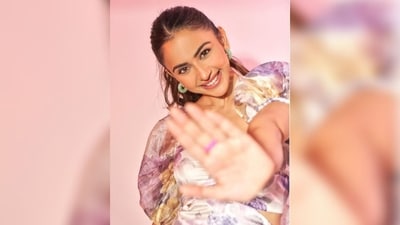 Rakul. assisted by fashion stylist Anshika Verma, accessorised her look with a pair of green hoop earrings and complemented it with white pump heels, adding the perfect finishing touches to her ensemble. (Instagram/@rakulpreet) Rakul. assisted by fashion stylist Anshika Verma, accessorised her look with a pair of green hoop earrings and complemented it with white pump heels, adding the perfect finishing touches to her ensemble. (Instagram/@rakulpreet)