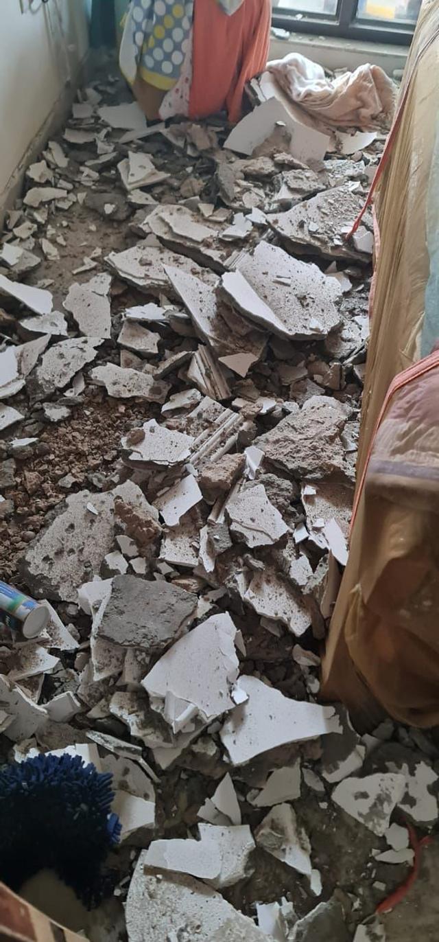 The plaster that fell inside the balcony of the ninth floor flat of the Vermas at Signature View Apartment in Mukherjee Nagar. (Sanchit Khanna/HT Photo) The plaster that fell inside the balcony of the ninth floor flat of the Vermas at Signature View Apartment in Mukherjee Nagar. (Sanchit Khanna/HT Photo)