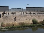 The department said the gang charged migrants between $10,000 and $70,000 for package deals of travel to Mexico, fake documents and smuggling fees to enter the United States. (File) The department said the gang charged migrants between $10,000 and $70,000 for package deals of travel to Mexico, fake documents and smuggling fees to enter the United States. (File)