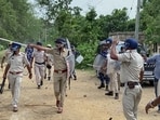 Police and paramilitary personnel reach the site where the violence took place on the last day of West Bengal panchayat polls, at Sainthia BDO office, Ahmadpur, in Birbhum on Thursday. Police and paramilitary personnel reach the site where the violence took place on the last day of West Bengal panchayat polls, at Sainthia BDO office, Ahmadpur, in Birbhum on Thursday.