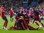 Spain's Joselu is celebrated by his team after he scored the decisive last goal against Italy Spain's Joselu is celebrated by his team after he scored the decisive last goal against Italy