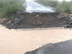 Cyclone Biparjoy: A small bridge washed away amid strong winds and rainfall in Bhuj. Cyclone Biparjoy: A small bridge washed away amid strong winds and rainfall in Bhuj.
