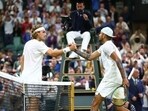 Australia's Nick Kyrgios with Greece's Stefanos Tsitsipas after winning their third round match
