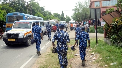 Security personnel patrol an area in view of the recent violence near Bhangar BDO 1 office during nomination filing for West Bengal Panchayat elections, in South 24 Parganas. (ANI)