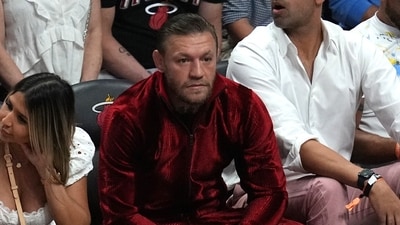 Conor McGregor looks on during the first half in game four of the 2023 NBA Finals (USA TODAY Sports via Reuters Con)