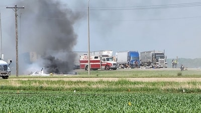 Smoke comes out of a car as first responders are pictured following a road accident that left 15 dead near Carberry, west of Winnipeg, Canada. (AFP) Smoke comes out of a car as first responders are pictured following a road accident that left 15 dead near Carberry, west of Winnipeg, Canada. (AFP)