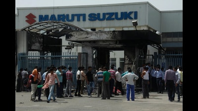 Clashes between the Maruti Suzuki management and workers in Gurgaon on July 19, 2012. (Manoj Kumar/Hindustan Times Archive)