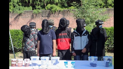 Jammu and Kashmir Police personnel arrested five hybrid terrorists allegedly involved in the killing of Udhampur circus worker Deepak Kumar in Anantnag, in Srinagar on Friday. (ANI) Jammu and Kashmir Police personnel arrested five hybrid terrorists allegedly involved in the killing of Udhampur circus worker Deepak Kumar in Anantnag, in Srinagar on Friday. (ANI)
