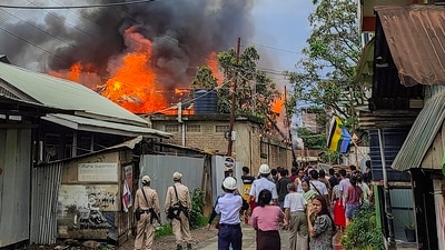 Unidentified miscreants torch two houses belonging to a particular community in Manipur on Thursday, (PTI) Unidentified miscreants torch two houses belonging to a particular community in Manipur on Thursday, (PTI)