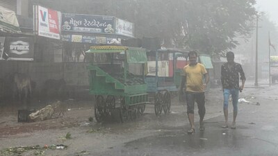 "Forty-five villages in Naliya tehsil of Kutch district plunged into darkness after electricity cables were snapped and poles got uprooted due to the cyclone," the official said. (PTI) "Forty-five villages in Naliya tehsil of Kutch district plunged into darkness after electricity cables were snapped and poles got uprooted due to the cyclone," the official said. (PTI)