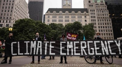 Climate activists during a "funeral march" in New York on June 8, when the city was blanketed with haze caused by Canadian wildfires. (AFP) Climate activists during a "funeral march" in New York on June 8, when the city was blanketed with haze caused by Canadian wildfires. (AFP)