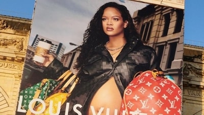 Rihanna bares baby bump for Pharrell William's new Louis Vuitton campaign as brand's new Men's Creative Director. (Instagram ) Rihanna bares baby bump for Pharrell William's new Louis Vuitton campaign as brand's new Men's Creative Director. (Instagram )