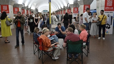 Local residents take shelter in a metro station in the centre of Kyiv during a Russian missile attack. (AFP) Local residents take shelter in a metro station in the centre of Kyiv during a Russian missile attack. (AFP)
