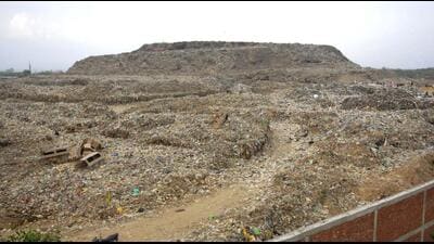 The garbage dump at Dadumajra; for the first time, the civic body has decided to take a few residents from Dadumajra, along with the councillors, to study the Goa plant, which is also running as per the suggestions of the National Environmental Engineering Research Institute (NEERI). (HT File) The garbage dump at Dadumajra; for the first time, the civic body has decided to take a few residents from Dadumajra, along with the councillors, to study the Goa plant, which is also running as per the suggestions of the National Environmental Engineering Research Institute (NEERI). (HT File)