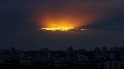 A view shows the Ukrainian capital at sunset during an air raid alert. (Reuters)