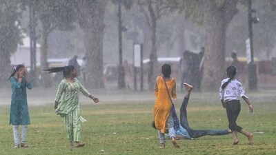 Delhites enjoying rain spell that arrived Friday, under the influence of cyclone Biparjoy that hit Gujarat Thursday, (HT Photo/ Vipin kumar) Delhites enjoying rain spell that arrived Friday, under the influence of cyclone Biparjoy that hit Gujarat Thursday, (HT Photo/ Vipin kumar)
