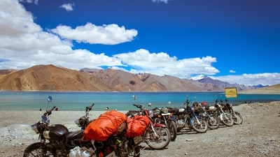 Ride through the Himalayas: Embark on the legendary Manali-Leh Highway, a high-altitude route that will take your breath away. Traverse snow-capped peaks, winding roads, and serene valleys as you make your way through this mesmerizing landscape. (Vamshi Vangapally on Unsplash) Ride through the Himalayas: Embark on the legendary Manali-Leh Highway, a high-altitude route that will take your breath away. Traverse snow-capped peaks, winding roads, and serene valleys as you make your way through this mesmerizing landscape. (Vamshi Vangapally on Unsplash)
